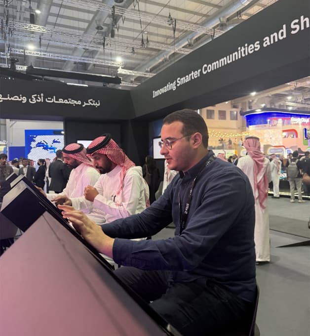 Oussama Boudokhane reviewing architectural drawings